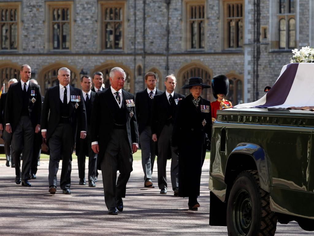 The family walks behind the coffin. Picture: AFP