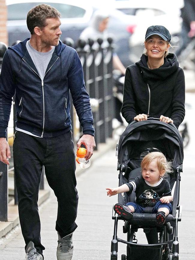 Sam and Lara Worthington with their son Rocket Zot . Picture: Getty