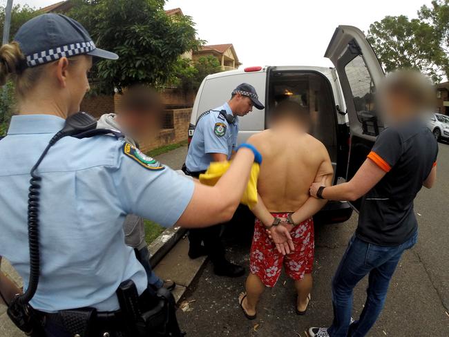 Police arrest suspect after the massive seizure of 720 litres of liquid meth. Picture: AFP