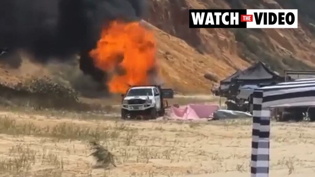 Ute bursts into flames on Rainbow Beach