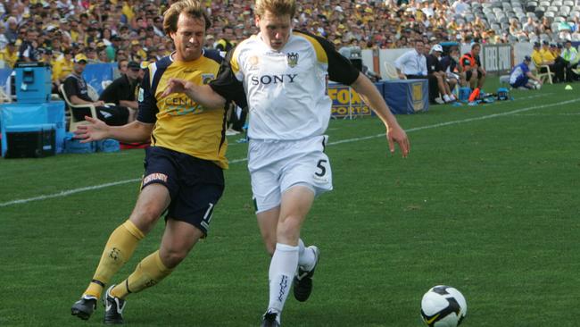 Dylan Macallister (left) in his playing days with the Mariners.