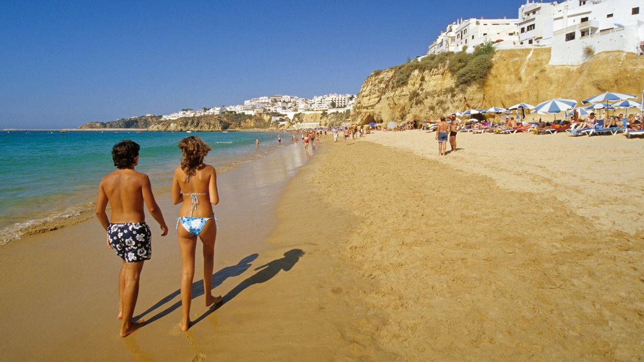 Albufeira council chiefs are also going to war on people walking the streets in trikinis and pants. Picture: Alamy