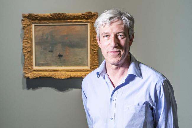 Leading French art conservator Christian Chatellier helped salvage art treasures from the Notre Dame Cathedral fire. Now he has brought the iconic Claude Monet painting, Impression, sunrise, 1872, safely to the National Gallery of Australia for exhibition. Picture: National Gallery of Australia