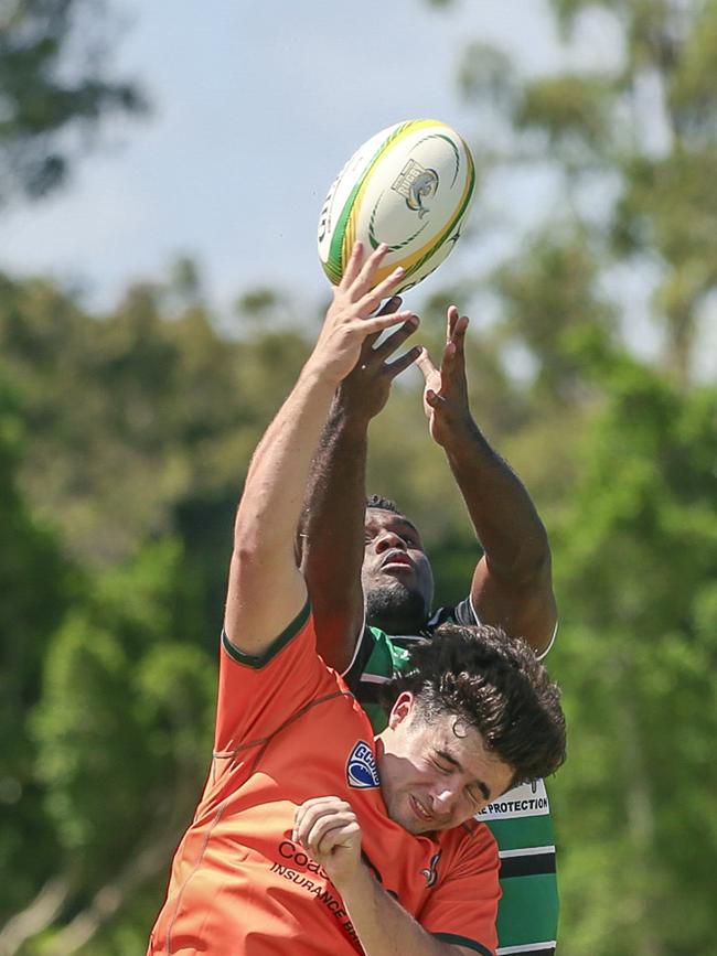 Jakeb Riori and Daniel Mallum contest as Surfers Paradise Dolphins host Queensland Premier Rugby club Sunnybank at Broadbeach Waters. Picture:Glenn Campbell