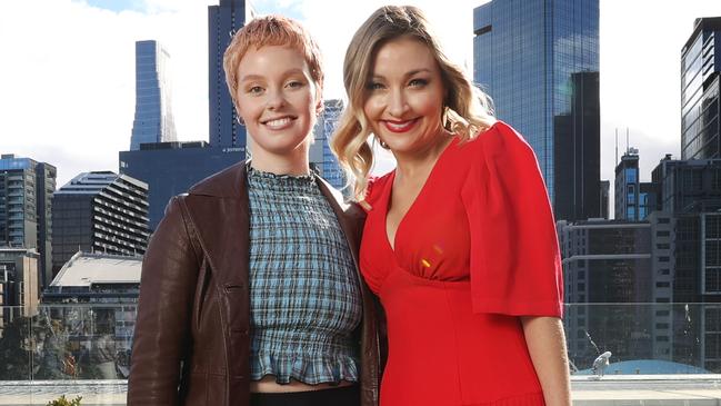 Young cancer patient Tess McMurtrie and singer Kate Miller-Heidke. Picture: David Caird