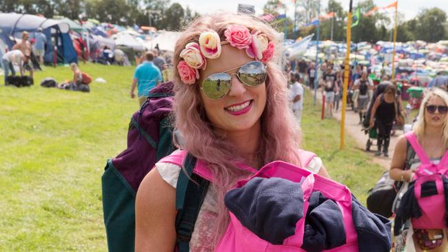 A music fan arrives at the The Glastonbury Music Festival on Wednesday, June 24, 2015 at Worthy Farm, Glastonbury, England. (Photo by Jim Ross/Invision/AP)