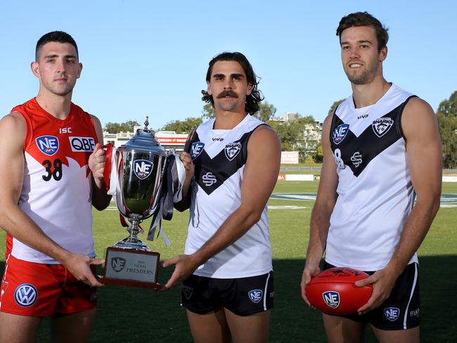 NEAFL Grandfinal captains Colin O'Riordan (Sydney Swans) along with Andrew Boston and Seb Tape for Southport Sharks. Picture: AAPimage/David Clark.