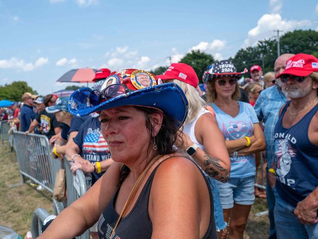 People line up to see Republican presidential nominee, former U.S. President Donald Trump speak on July 31, 2024 in Harrisburg, Pennsylvania. Trump is returning to Pennsylvania for the first time since the assassination attempt. Polls currently show a close race with Democratic presidential candidate, U.S. Vice President Kamala Harris. Spencer Platt/Getty Images/AFP (Photo by SPENCER PLATT / GETTY IMAGES NORTH AMERICA / Getty Images via AFP)