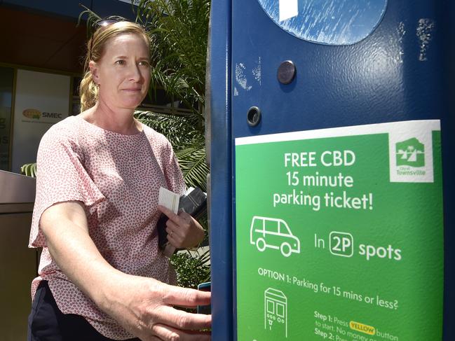 Melissa Rake paying for parking in the Townsville City CBD. PICTURE: MATT TAYLOR.