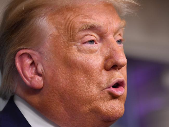 US President Donald Trump speaks during a news conference in the Brady Briefing Room of the White House in Washington, DC, on August 12, 2020. (Photo by Nicholas Kamm / AFP)