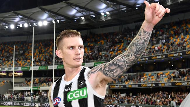 Dayne Beams of the Magpies celebrates winning the Round 5 AFL match between the Brisbane Lions and the Collingwood Magpies at the Gabba in Brisbane, Thursday, April 18, 2019. (AAP Image/Darren England) NO ARCHIVING, EDITORIAL USE ONLY