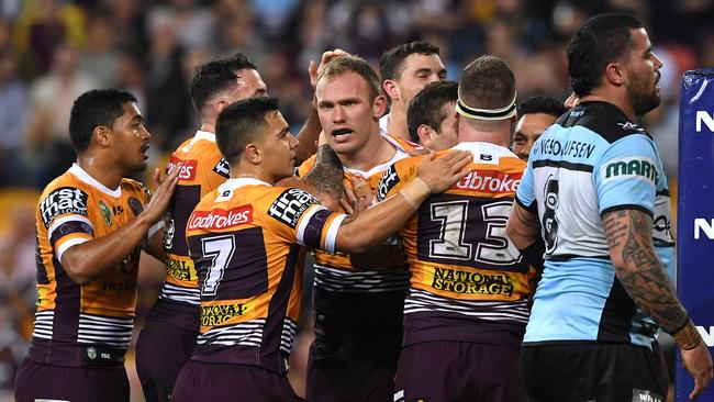 Brisbane defended like their lives depended on it. AAP Image/Dave Hunt.