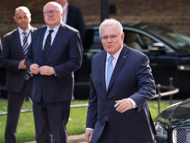 Prime Minister Scott Morrison arrives at 10 Downing Street before agreeing on a historic trade deal. Picture: AFP