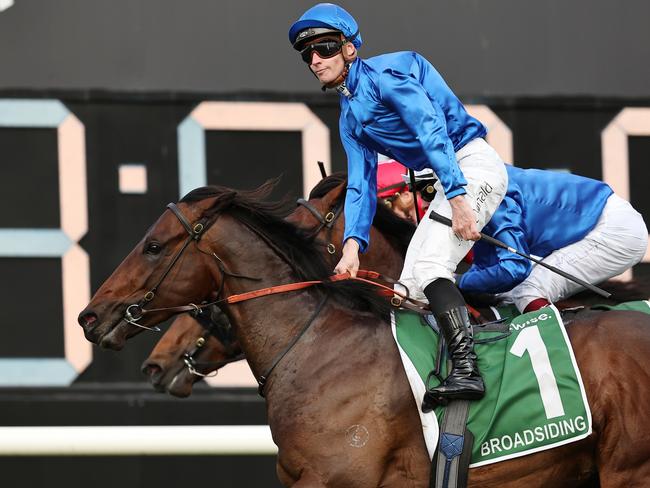 SYDNEY, AUSTRALIA - SEPTEMBER 28: James McDonald riding Broadsiding wins Race 8 James Squire Golden Rose during "Golden Rose Day" Sydney Racing at Rosehill Gardens on September 28, 2024 in Sydney, Australia. (Photo by Jeremy Ng/Getty Images)