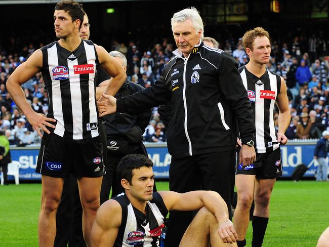 Mick Malthouse with Scott Pendlebury after the 2011 Grand Final.