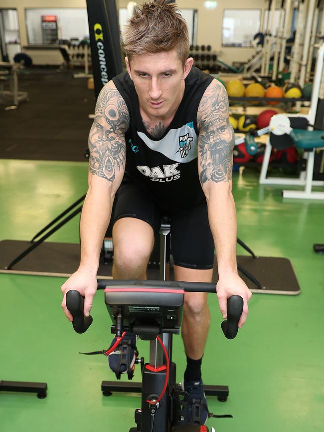 Harlett trains in Port Adelaide’s gym. Picture: Dylan Coker