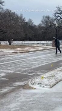 Man skates down street in north Texas as ice storms hit