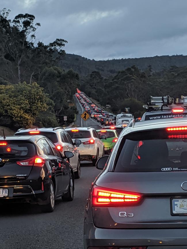 Commuters grind to a halt on the Southern Outlet after a crash blocks traffic. Picture: DAVID KILLICK