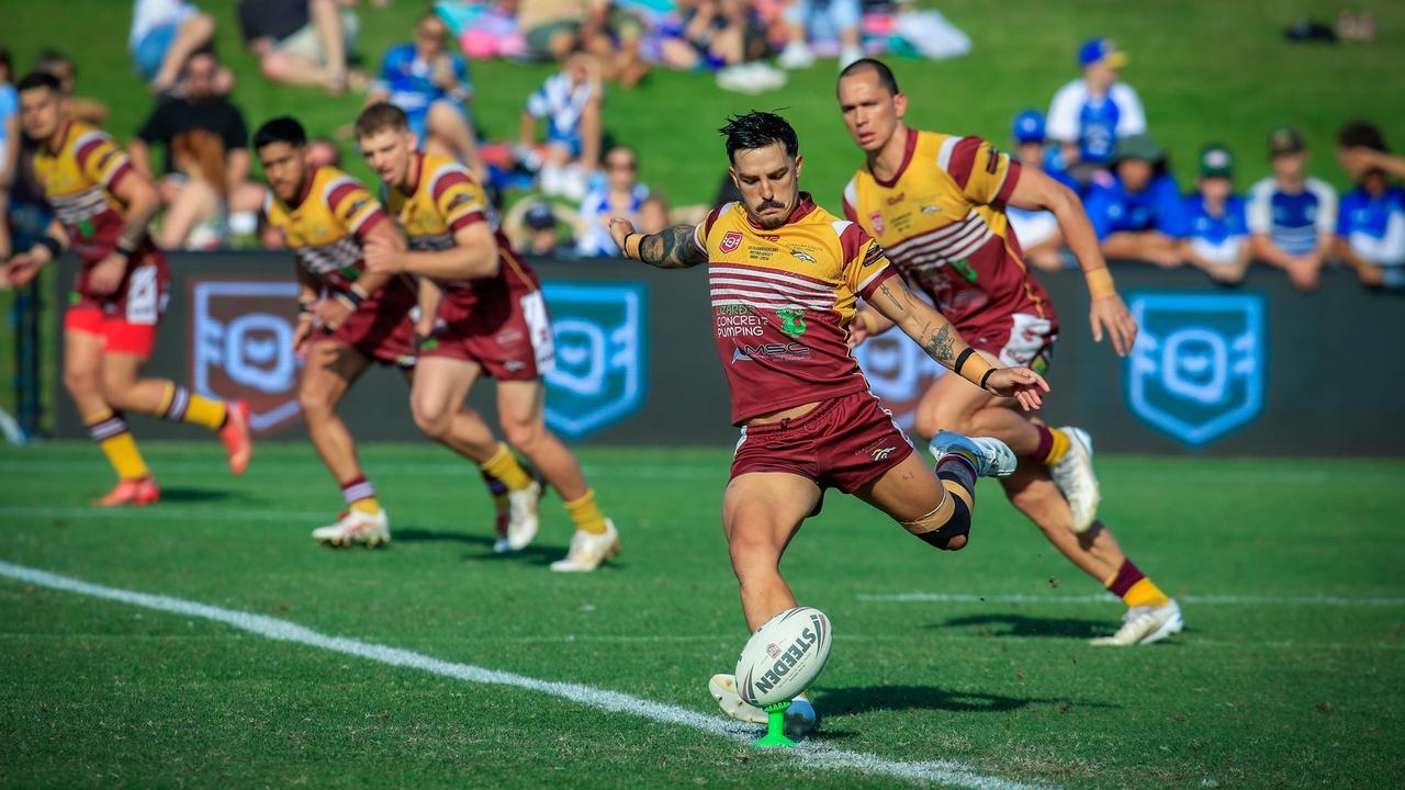 Coolum Colts player Seaton Reid kicks off. Picture: Phil Bradeley