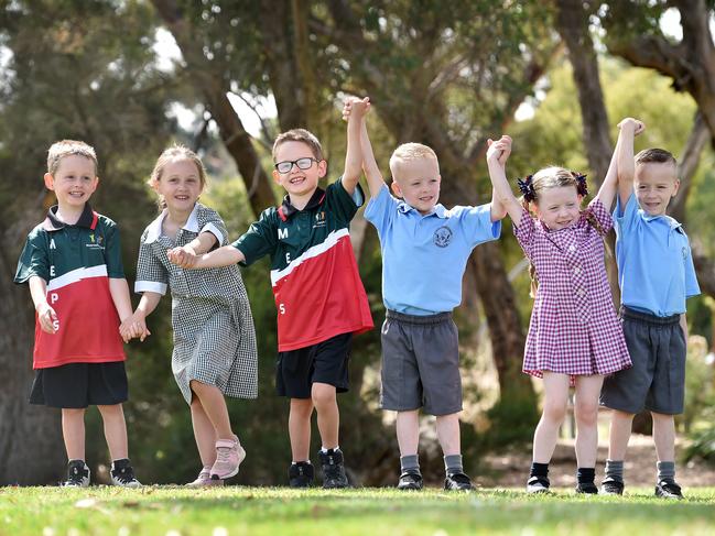 The Eastern Multiple Births Association has 13 families with either twins or triplets starting school next week. Two of those families have triplets. Noah, Ava, Ollie Beaton, 5 and Ashton, Isabelle, Zac Lally, 5.Picture : Nicki Connolly