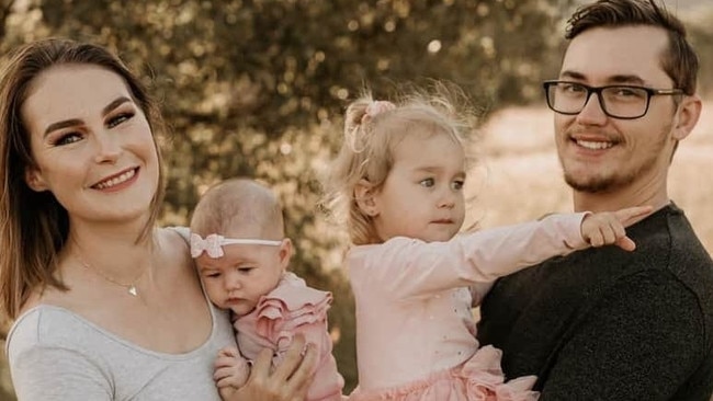 Brendan Tyrrell and his wife Aliesha with their young children.