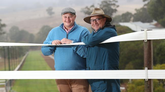 Leading trainer Tony McEvoy, right, with his son Calvin. Picture: Tait Schmaal