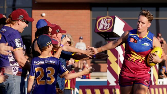 Brisbane fans welcome Dakota Davidson onto the field on Sunday. Picture: Russell Freeman/AFL Photos