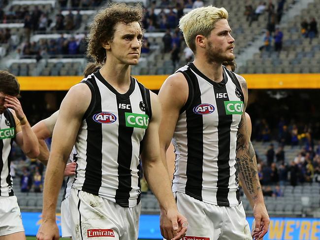 PERTH, AUSTRALIA - JULY 26: Collingwood leave the field after the teams defeat during the round 8 AFL match between the West Coast Eagles and the Collingwood Magpies at Optus Stadium on July 26, 2020 in Perth, Australia. (Photo by Will Russell/AFL Photos/via Getty Images)