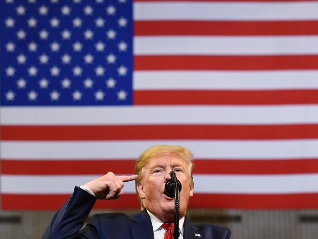 US President Donald Trump tried to rally his conservative base in Louisiana while saying that the “deranged” impeachment inquiry has been “hard”. Picture: AFP