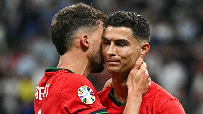 Ronaldo and defender Ruben Dias after Portugal’s win. Picture: AFP