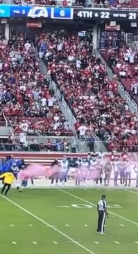 Rams players tackle fan who ran onto the field