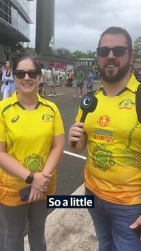 Couple celebrating engagement with trip to the cricket