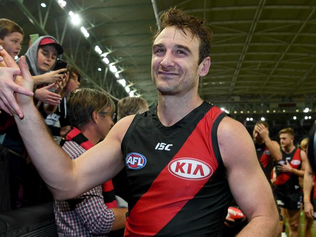 The Bombers celebrate a finals-clinching win in 2017. Picture: AAP Image/Joe Castro