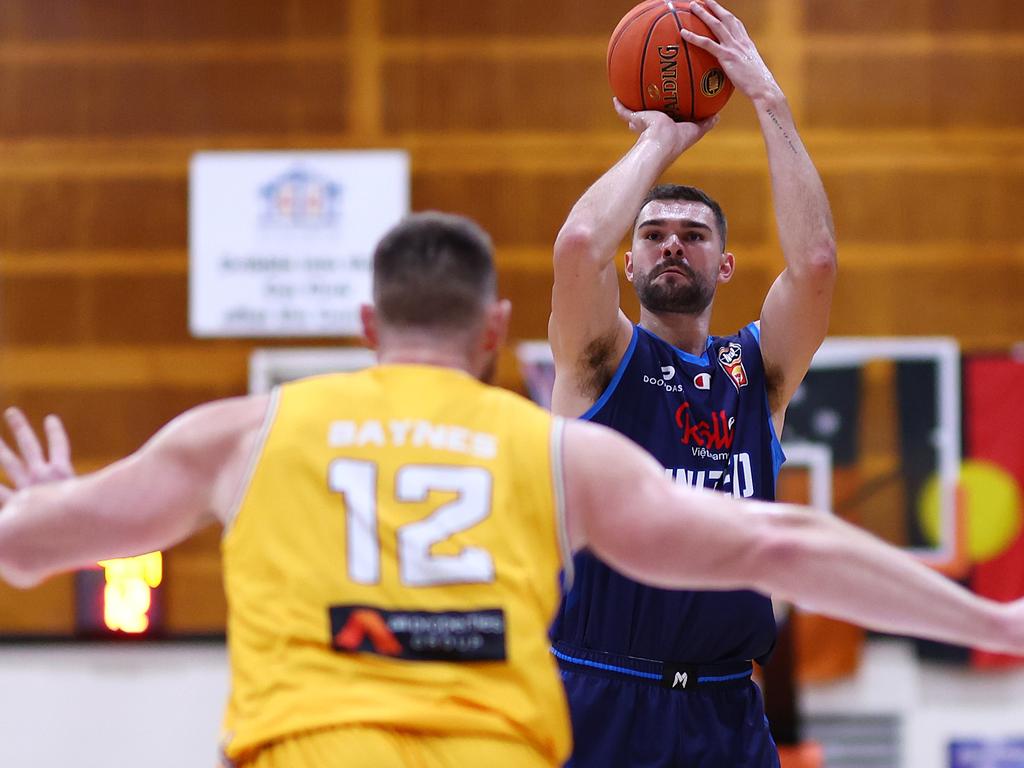 Melbourne United’s Isaac Humphries shoots against the Brisbane Bullets during the Blitz at Marrara. Picture: Graham Denholm/Getty Images.