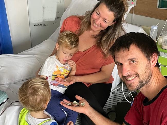 Leonardo and Samuele with their mum and dad in hospital. Picture: Supplied by family