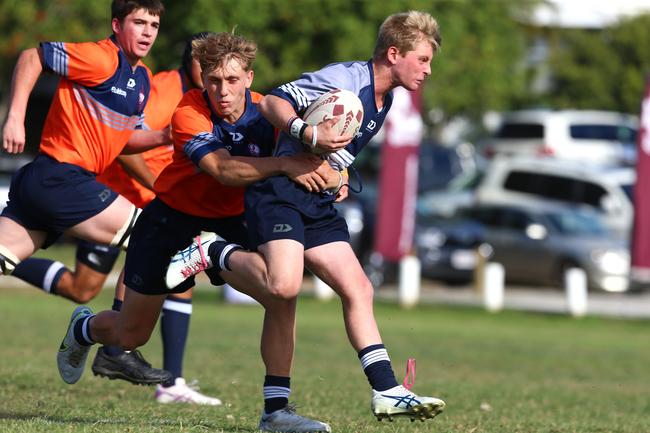 Charlie O’Connell runs the ball for the Brisbane Grey under-16s side at the 2022 Emerging Reds Cup at Riverside Rugby Club.