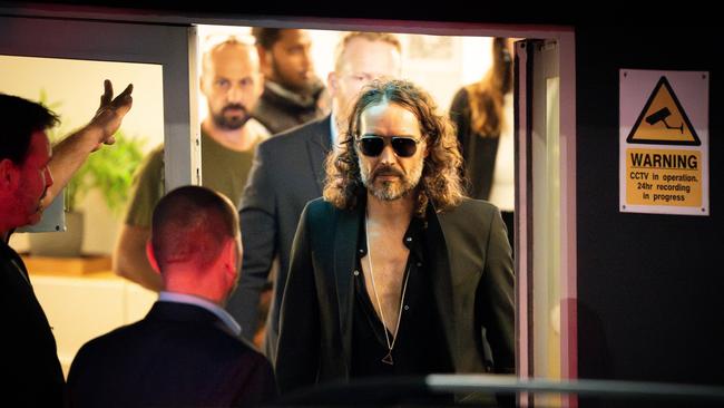 Russell Brand leaves the Troubabour Wembley Park theatre in north-west London after performing a comedy set. He faces claims about his sexual behaviour at the height of his fame. He has vehemently denied the allegations. Picture James Manning/PA Images via Getty Images