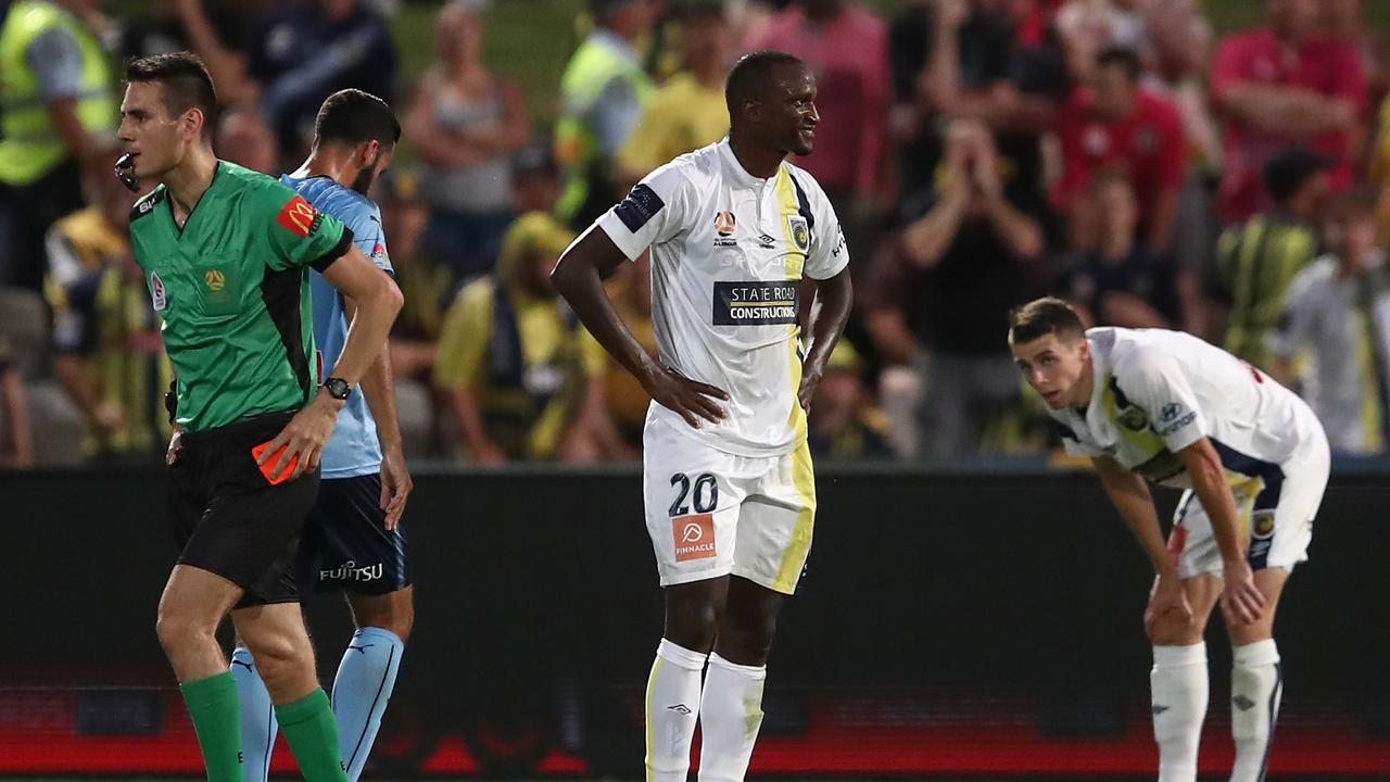 Kalifa Cisse of the Mariners is shown a red card by referee Jonathan Barreiro