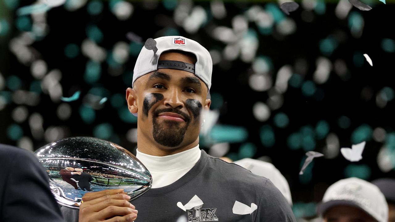 Eagles QB Jalen Hurts celebrates after securing the Super Bowl. Jamie Squire/Getty Images/AFP