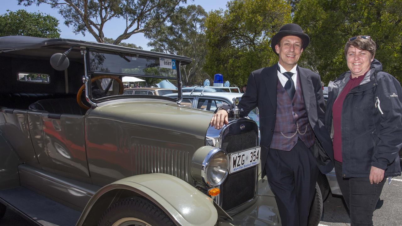 Michael Neale and Advertiser reporter Tara Miko with the vintage vehicle. Picture: Brett Hartwig