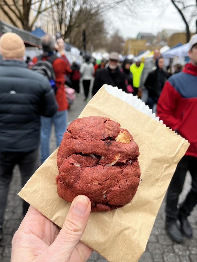 A plump, soft red velvet cookie, studded with white chocolate and with a cream cheese centre, from Short and Sweet Baked Treats is one of the many delectable sweet treats available at Salamanca Market. Picture: Alix Davis