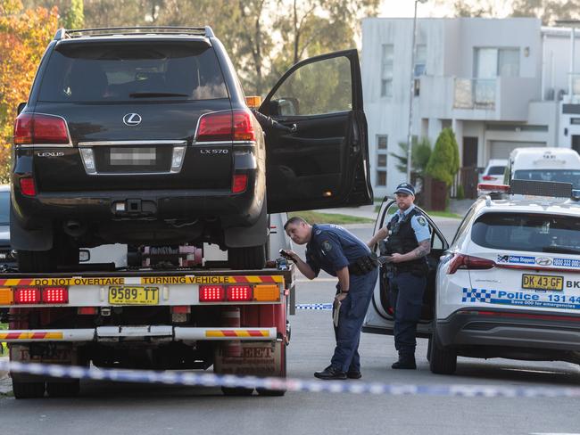 The car involved is taken away for forensic investigation. Picture: Newswire / Monique Harms