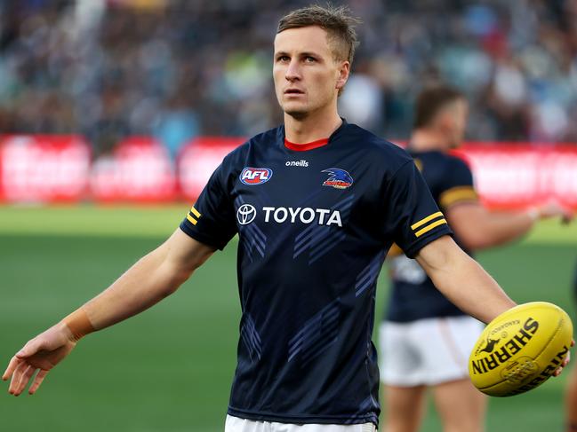 ADELAIDE, AUSTRALIA - APRIL 01: Jordan Dawson of the Crows warms up during the 2023 AFL Round 03 match between the Port Adelaide Power and the Adelaide Crows at Adelaide Oval on April 1, 2023 in Adelaide, Australia. (Photo by James Elsby/AFL Photos via Getty Images)