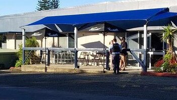 Police outside Wooli Bowling Club after reports a van smashed into the club and two other cars before speeding off. Picture: Nikki Voss