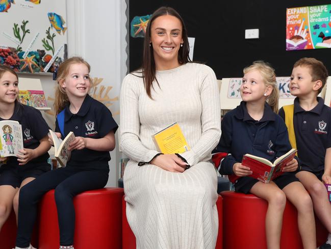 Newtown teacher Lily Bayes with students Lily, Winnie, Georgie and George. Second-year St Robert's Catholic School teacher Lily Bayes is sharing her story about her style of teaching, as part of Aus' Best Teachers campaign. Picture: Alan Barber