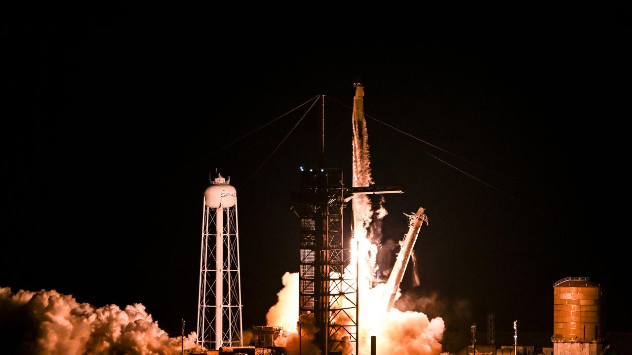 A SpaceX Falcon 9 rocket with the Crew Dragon Resilience capsule took the crew 1400 km above Earth. Picture: Chandan Khanna / AFP