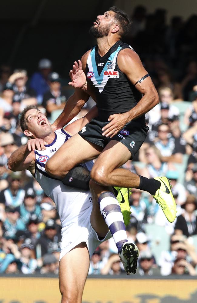 Port Adelaide’s Paddy Ryder rucks against Fremantle’s Aaron Sandilands.