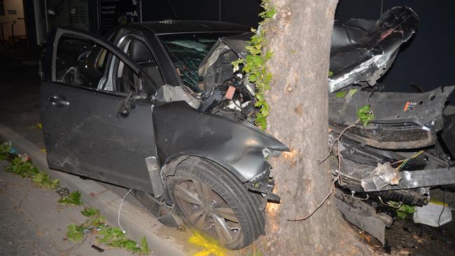 Gligora’s ute went on to crash into a wall of a West Tce business before slamming into a tree. Picture: SA Police