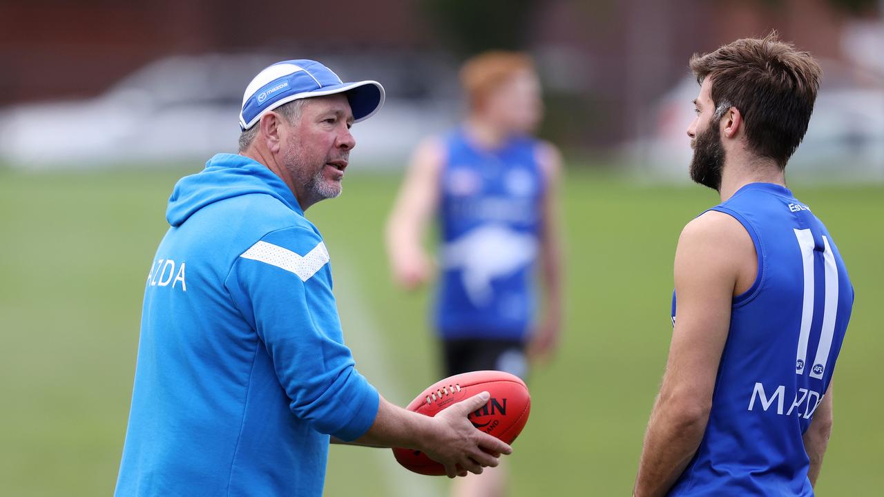 Brett Ratten chats to Luke McDonald at training. Picture: Mark Stewart