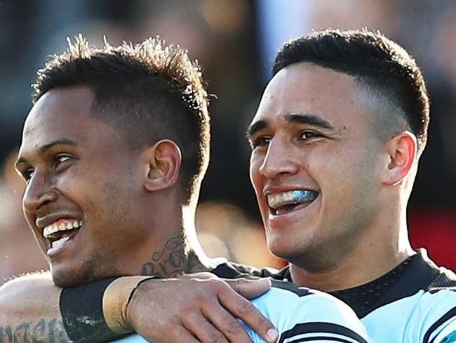 SYDNEY, AUSTRALIA - JULY 24:  Ben Barba of the Sharks celebrates with team mate Valentine Holmes after scoring a try during the round 20 NRL match between the Cronulla Sharks and the Newcastle Knights at Southern Cross Group Stadium on July 24, 2016 in Sydney, Australia.  (Photo by Brendon Thorne/Getty Images)